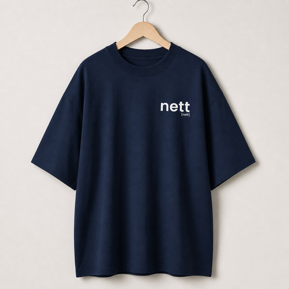 Dunkelblaues Oversized T-Shirt nett von JoisPulse, flach liegend fotografiert