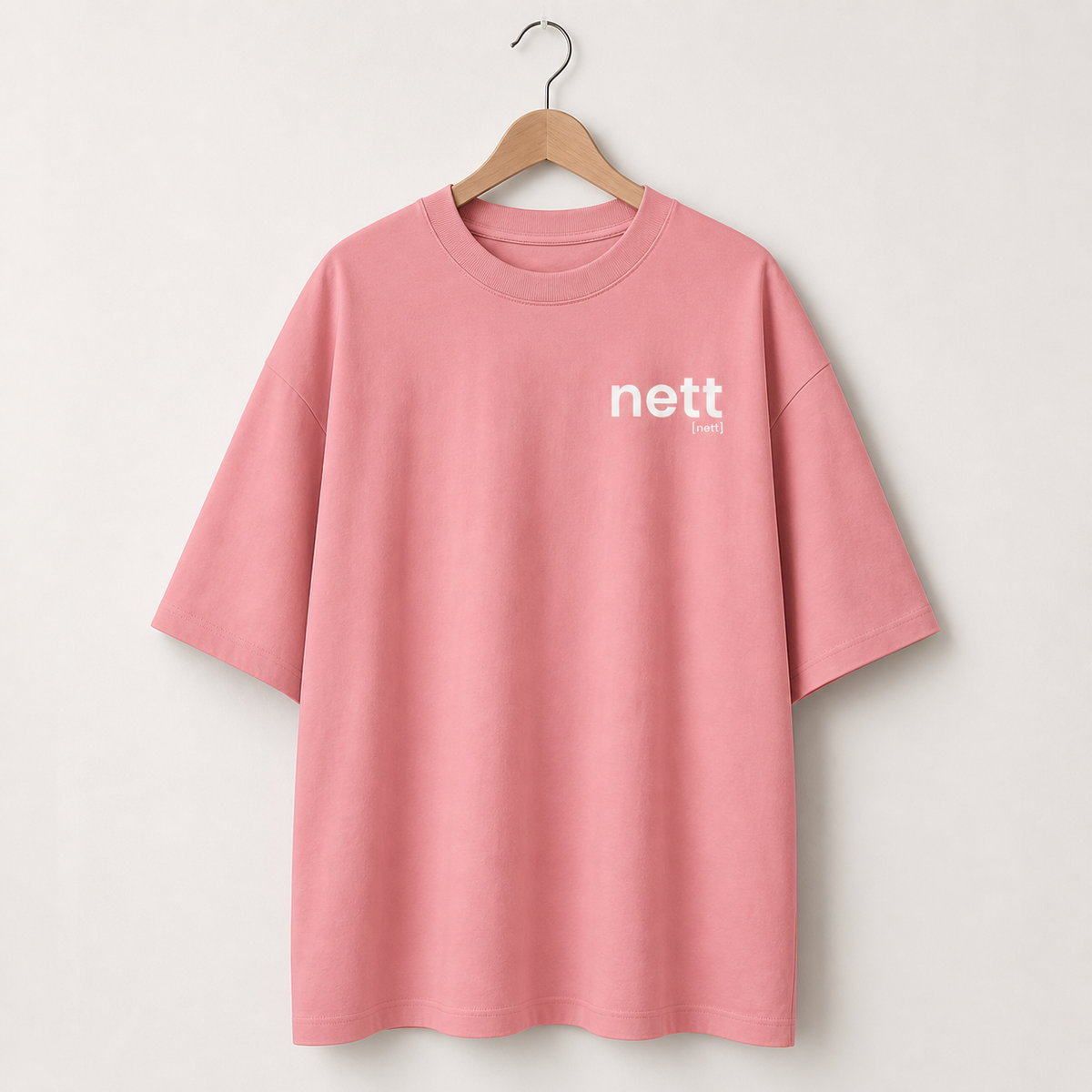 Rosafarbenes Oversized T-Shirt nett von JoisPulse, flach liegend fotografiert