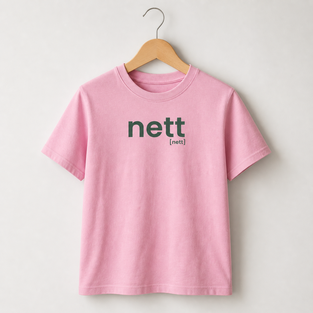 Rosafarbenes Kinder T-Shirt nett von JoisPulse, flach liegend fotografiert